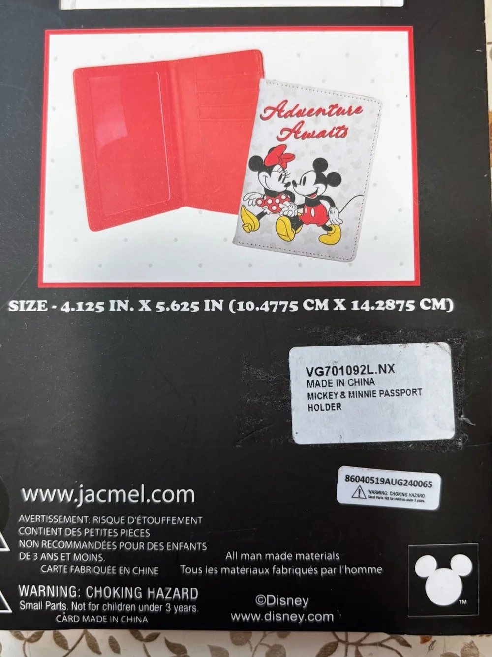 New. Micky Mouse passport holder.